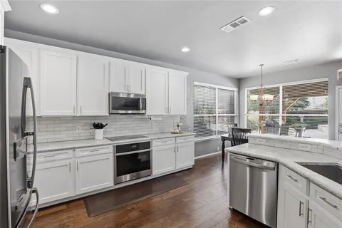 $585,000 | 2455 Whispering Breeze Drive, Grand Prairie, TX 75050