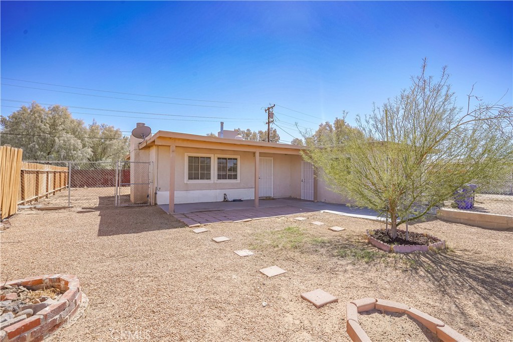 a view of a house with a yard and garage
