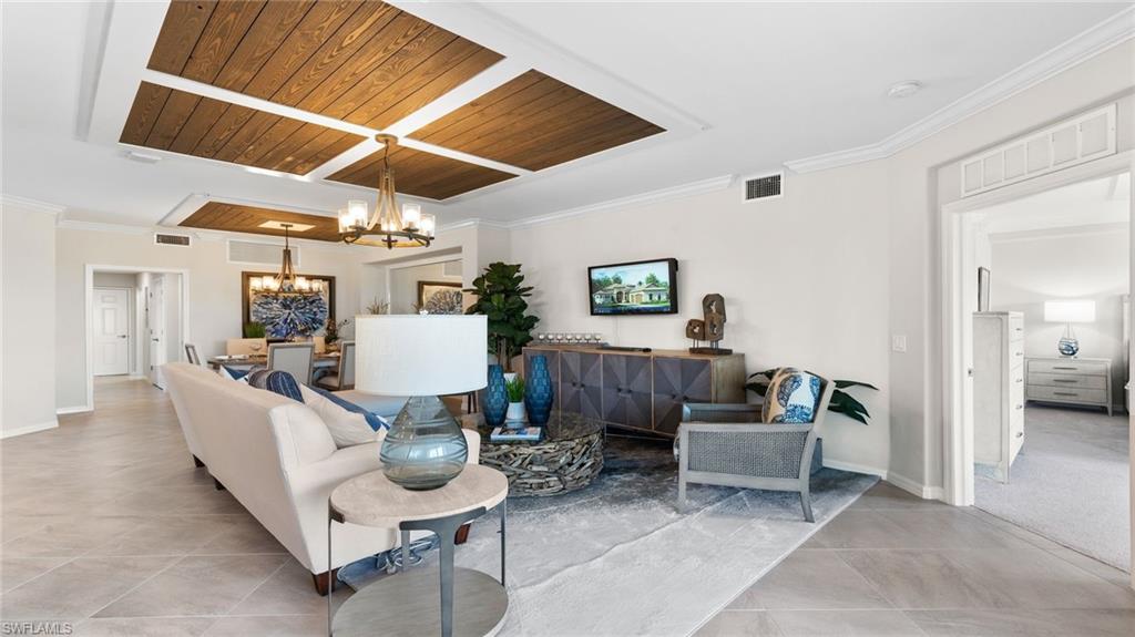 15170 Bluffton Lane, Unit 1811 Babcock Ranch, FL 33982 - Photo 7 of 20 a living room with furniture and a wooden floor