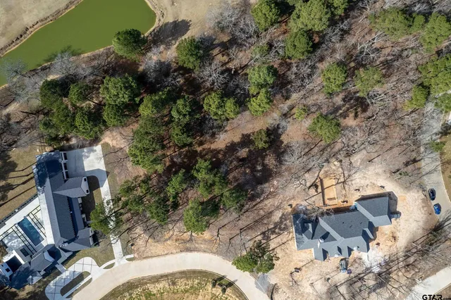 an aerial view of residential house with outdoor space