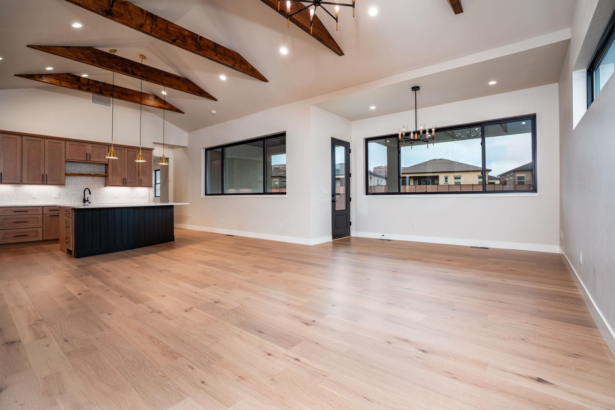 2304 Trail Ridge Road Grand Junction, CO 81507 - Photo 11 of 33 a view of kitchen and kitchen with stainless steel appliances wooden floor