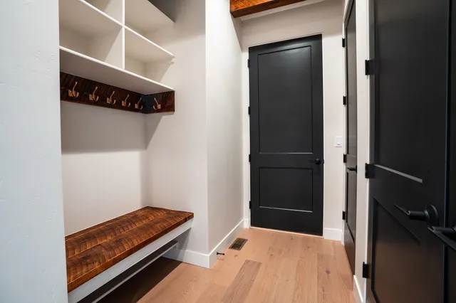 a room with a bed and a window