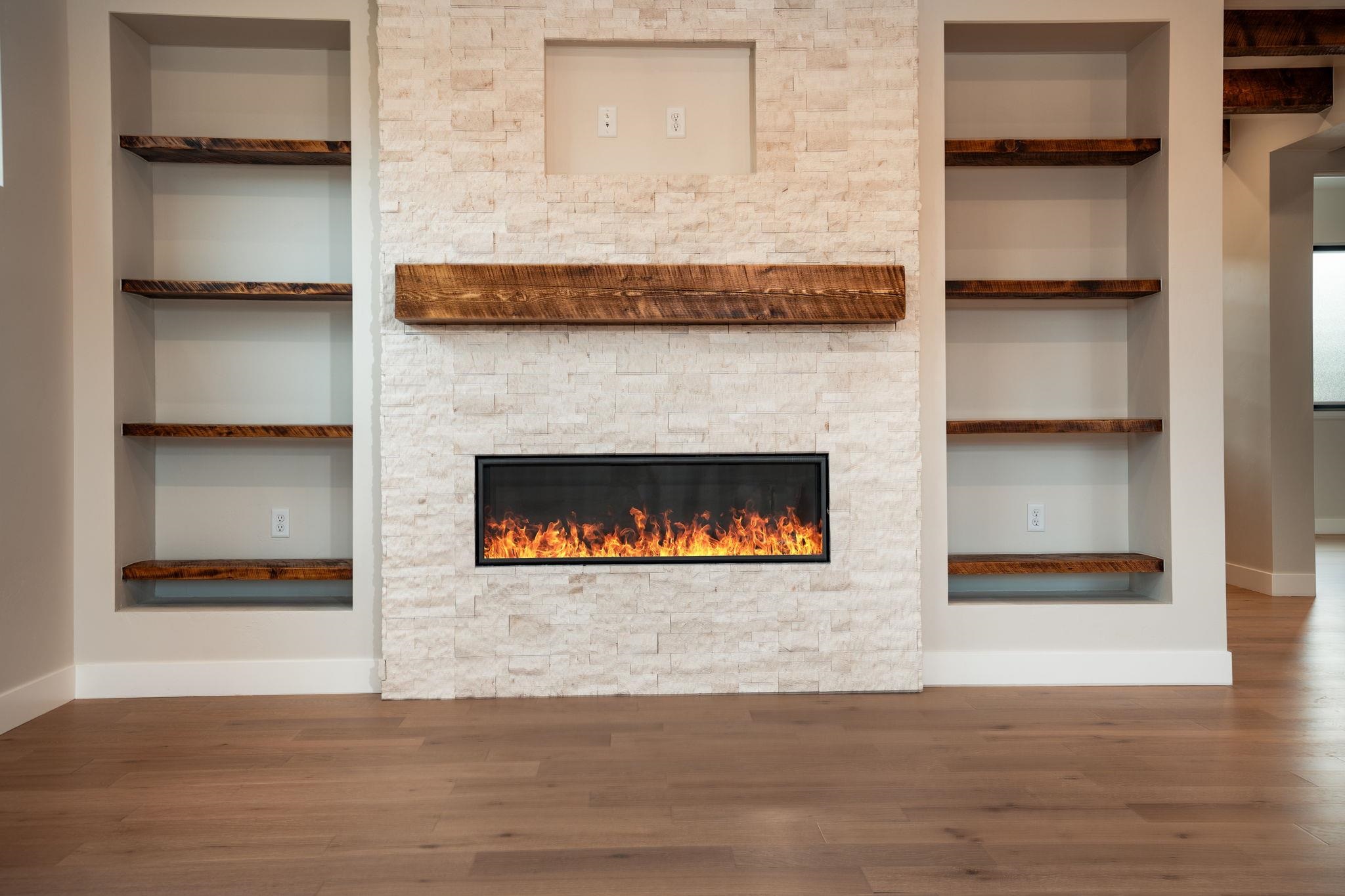 2304 Trail Ridge Road Grand Junction, CO 81507 - Photo 9 of 33 a living room with a fireplace