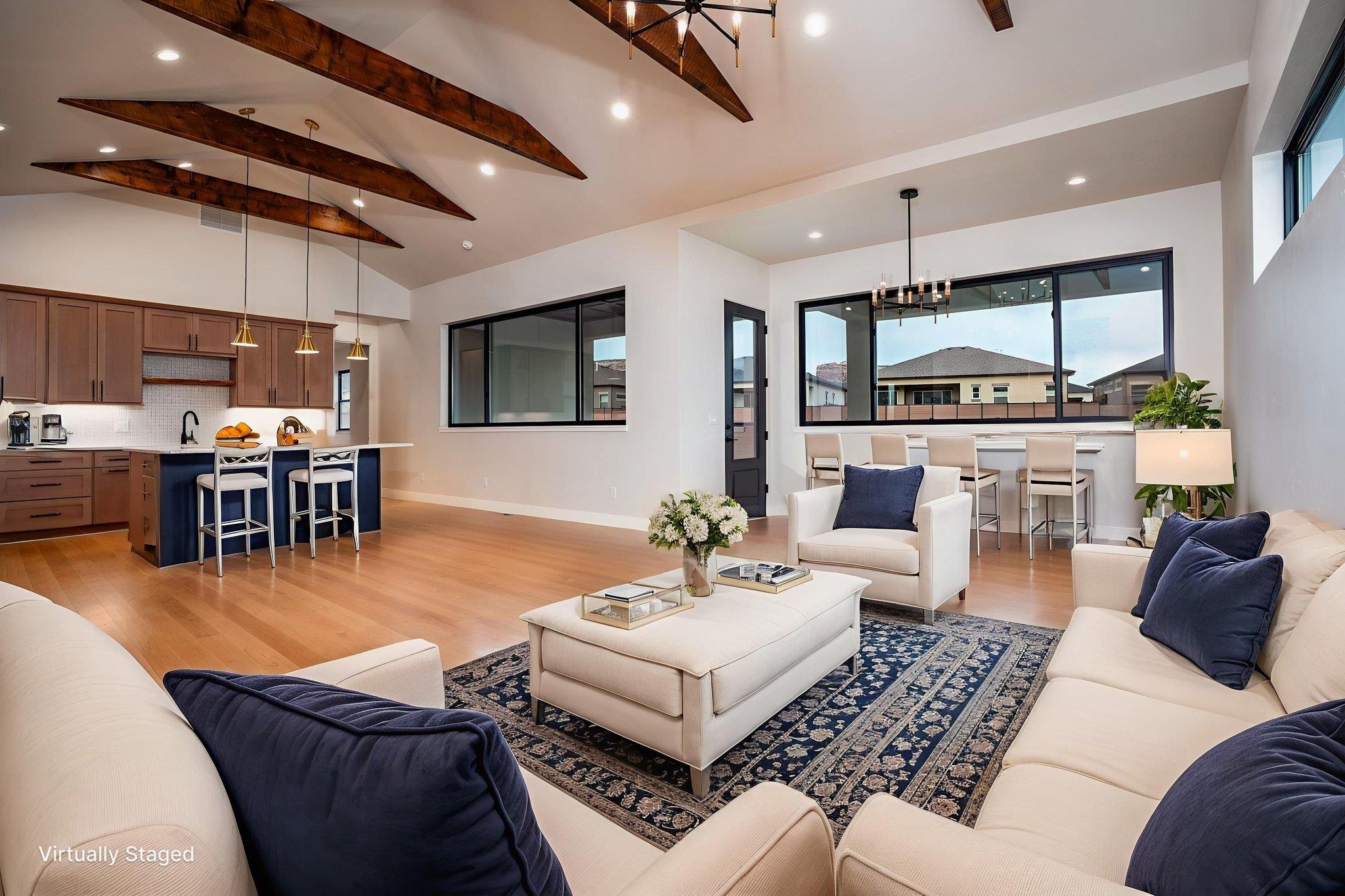 2304 Trail Ridge Road Grand Junction, CO 81507 - Photo 10 of 33 a living room with furniture and a large window