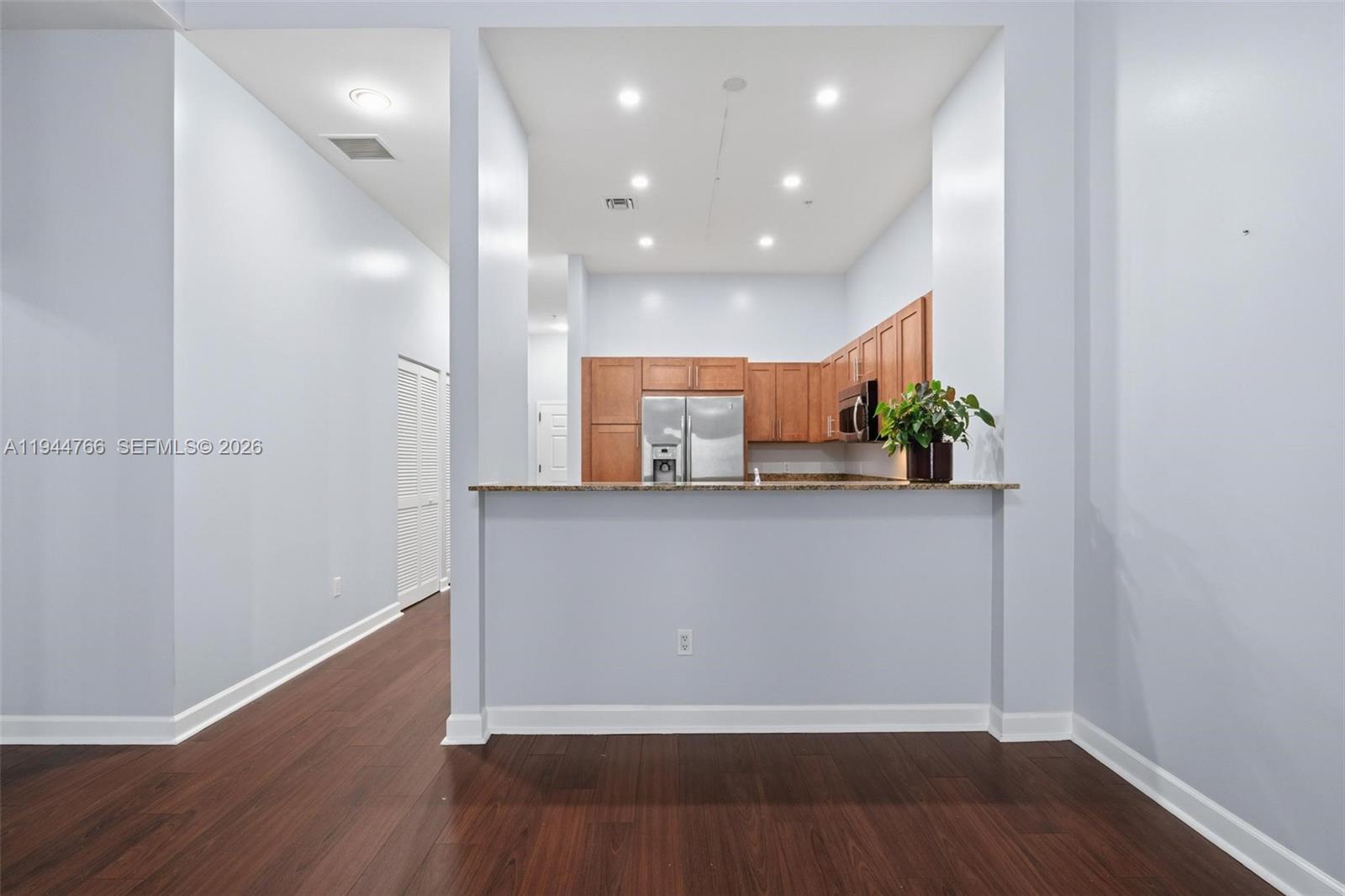8395 Southwest 73rd Avenue, Unit 314 Miami, FL 33143 - Photo 17 of 49 a view of hallway with wooden floor