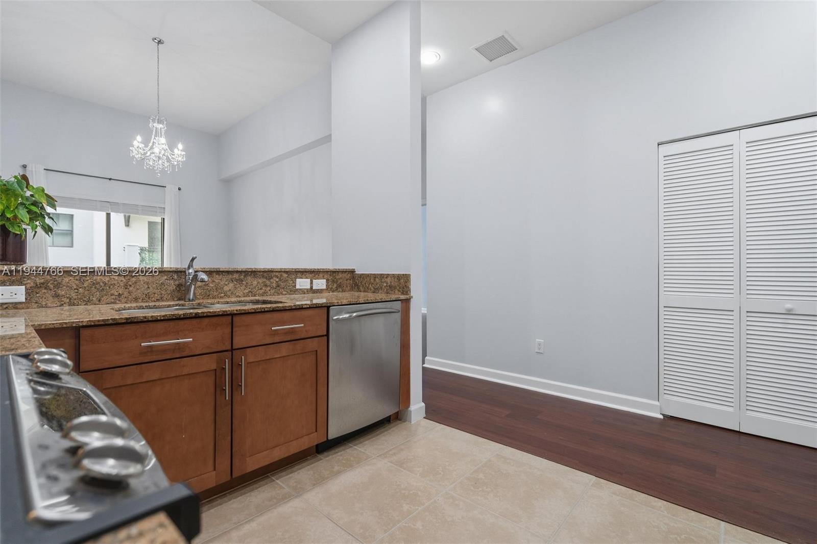 8395 Southwest 73rd Avenue, Unit 314 Miami, FL 33143 - Photo 24 of 49 a kitchen with a sink and cabinets