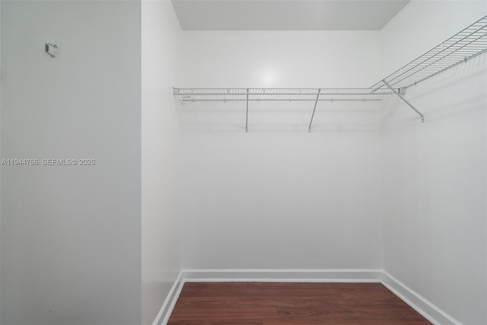 8395 Southwest 73rd Avenue, Unit 314 Miami, FL 33143 - Photo 35 of 49 a view of a room with racks on the wall