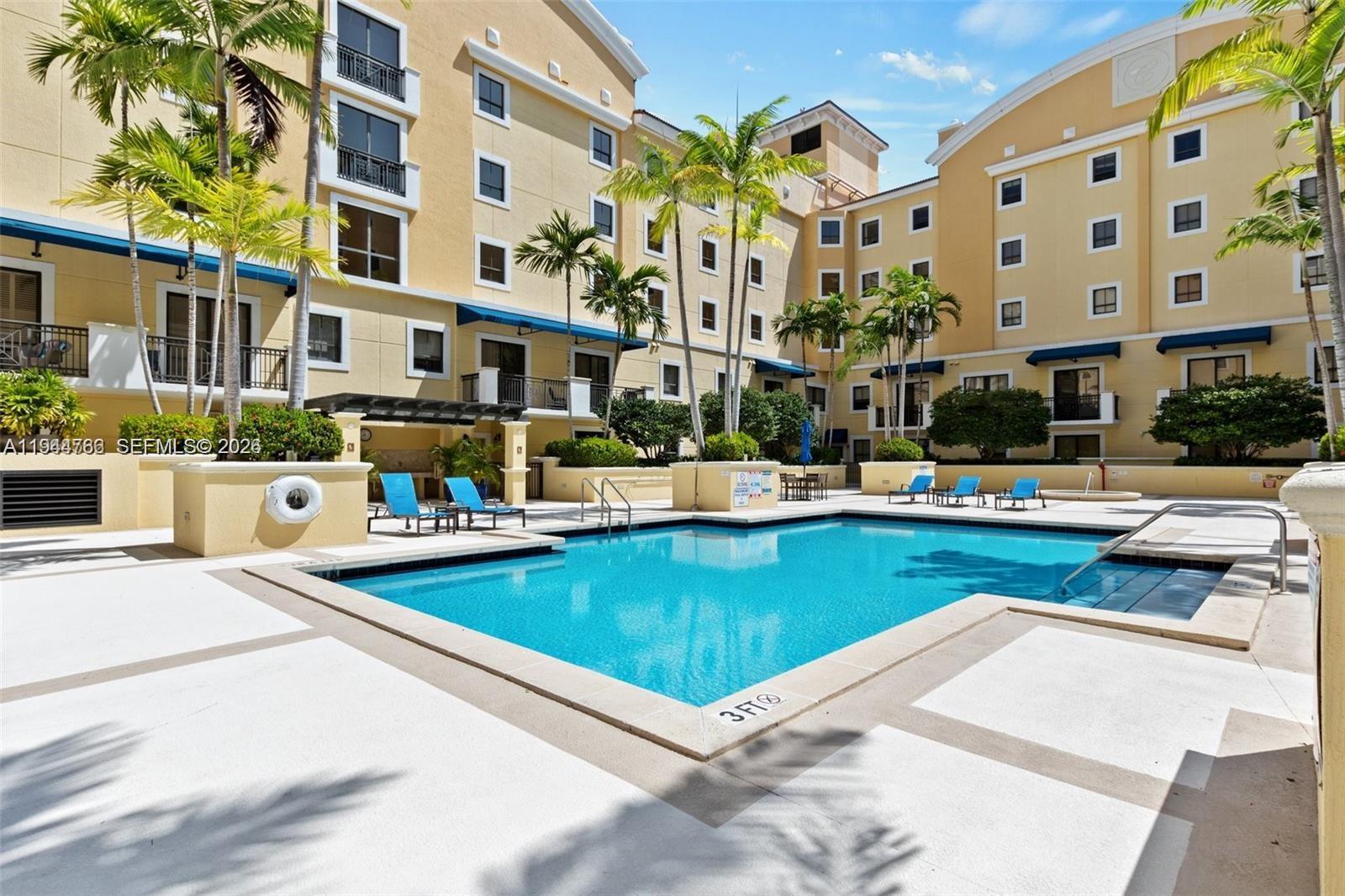 8395 Southwest 73rd Avenue, Unit 314 Miami, FL 33143 - Photo 47 of 49 a view of a building with swimming pool