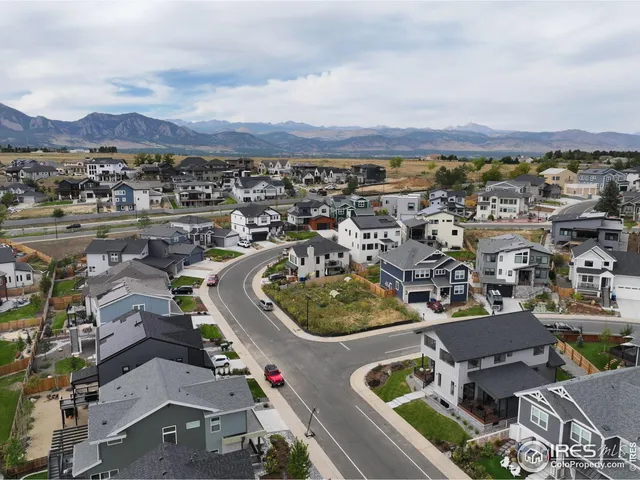 a view of a lake in middle of a city