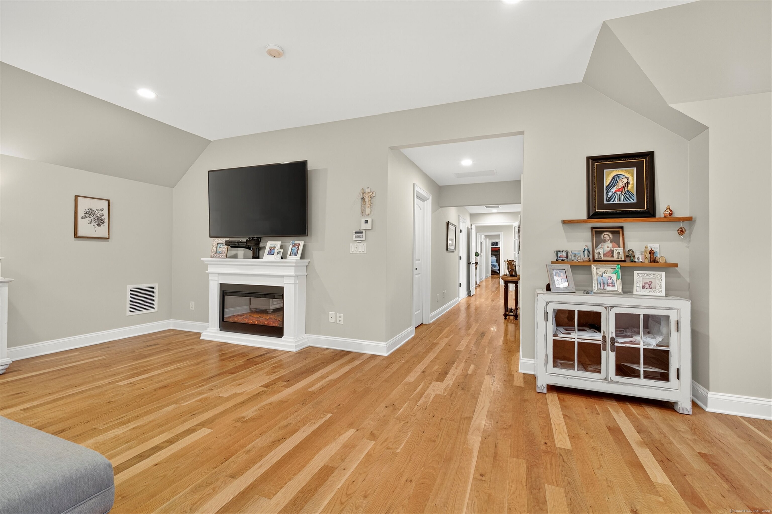 99 Carriage Lane Roxbury, CT 06783 - Photo 20 of 38 a view of a livingroom with furniture and a flat screen tv