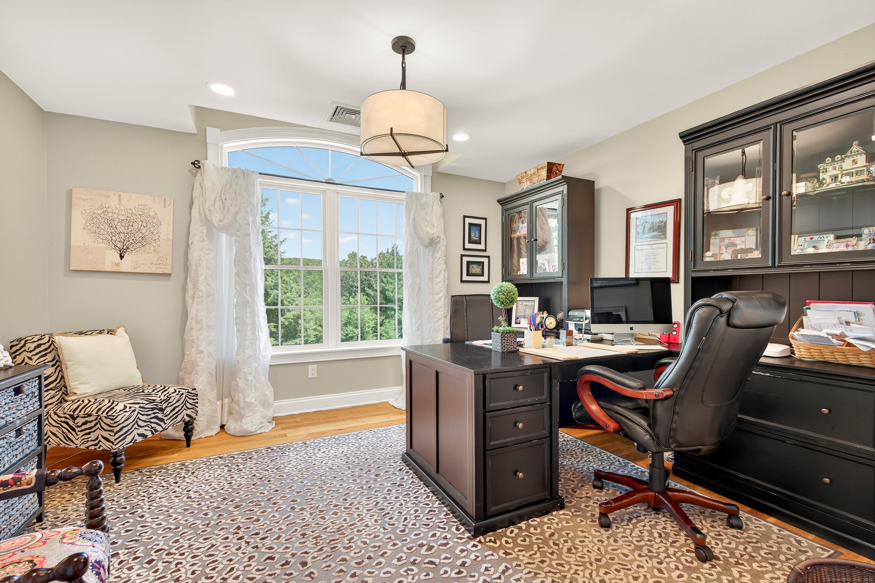 99 Carriage Lane Roxbury, CT 06783 - Photo 22 of 38 a view of a workspace with furniture and a window
