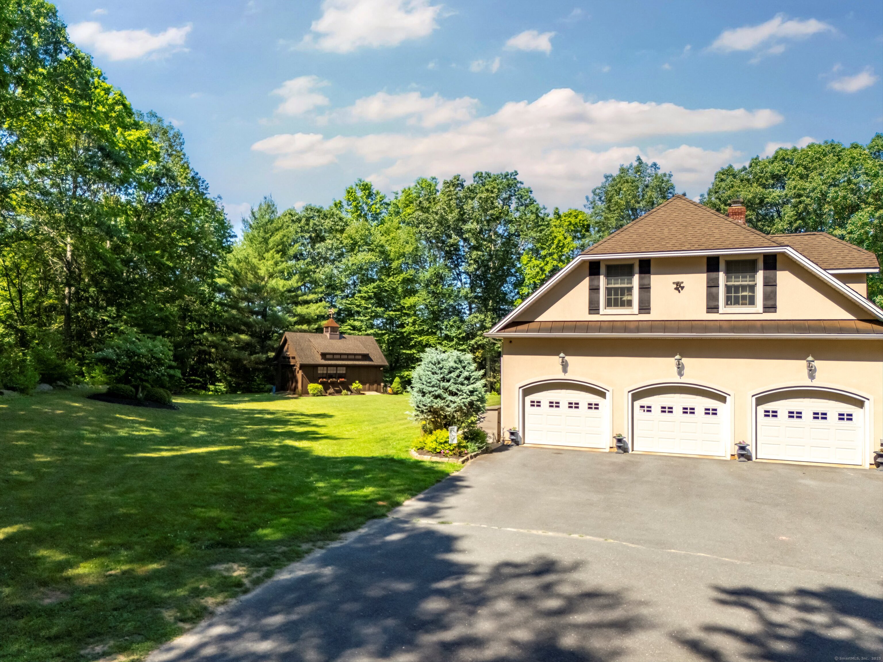 99 Carriage Lane Roxbury, CT 06783 - Photo 34 of 38 a view of a house with a yard