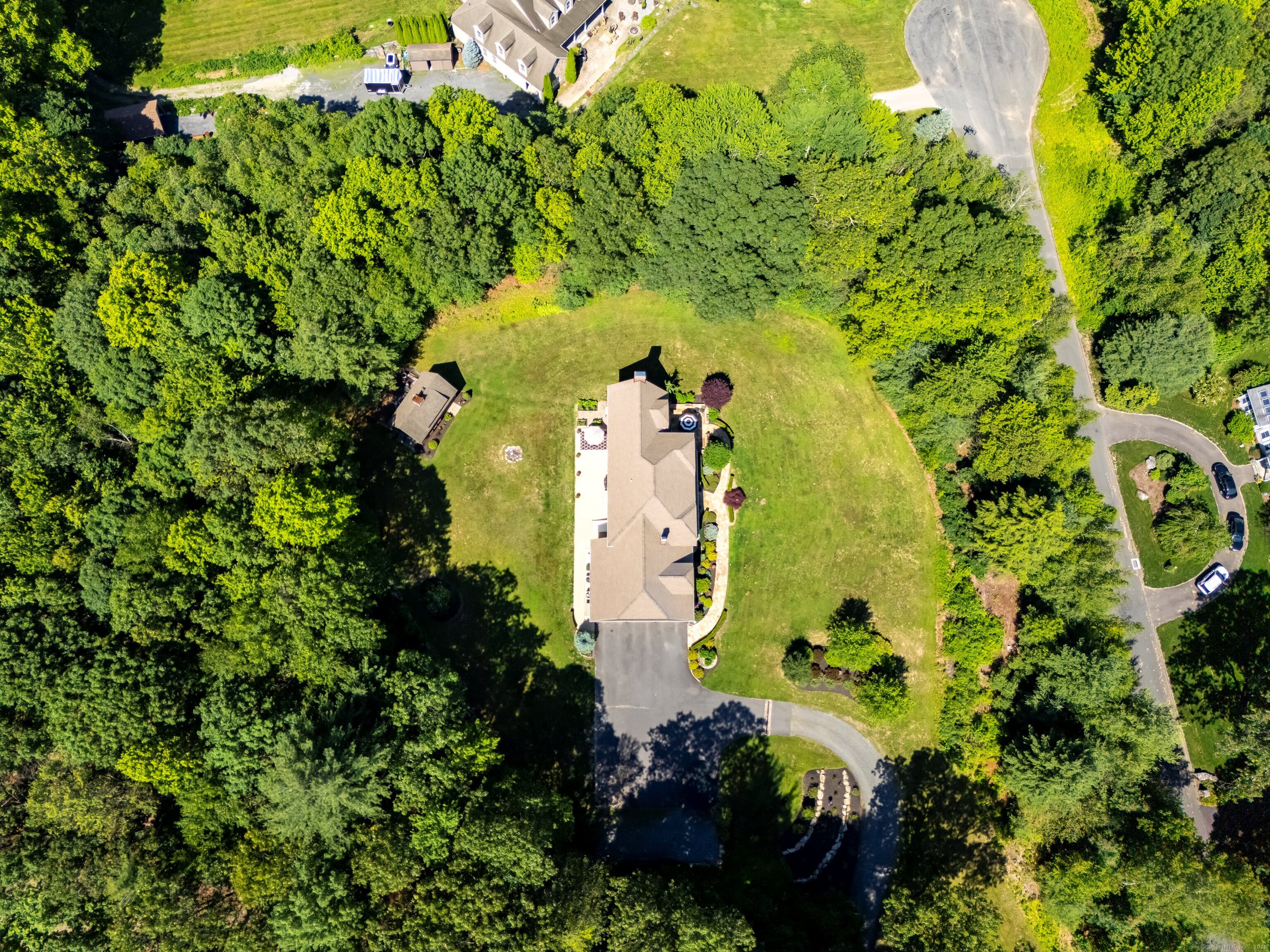 99 Carriage Lane Roxbury, CT 06783 - Photo 37 of 38 a view of a yard with plants