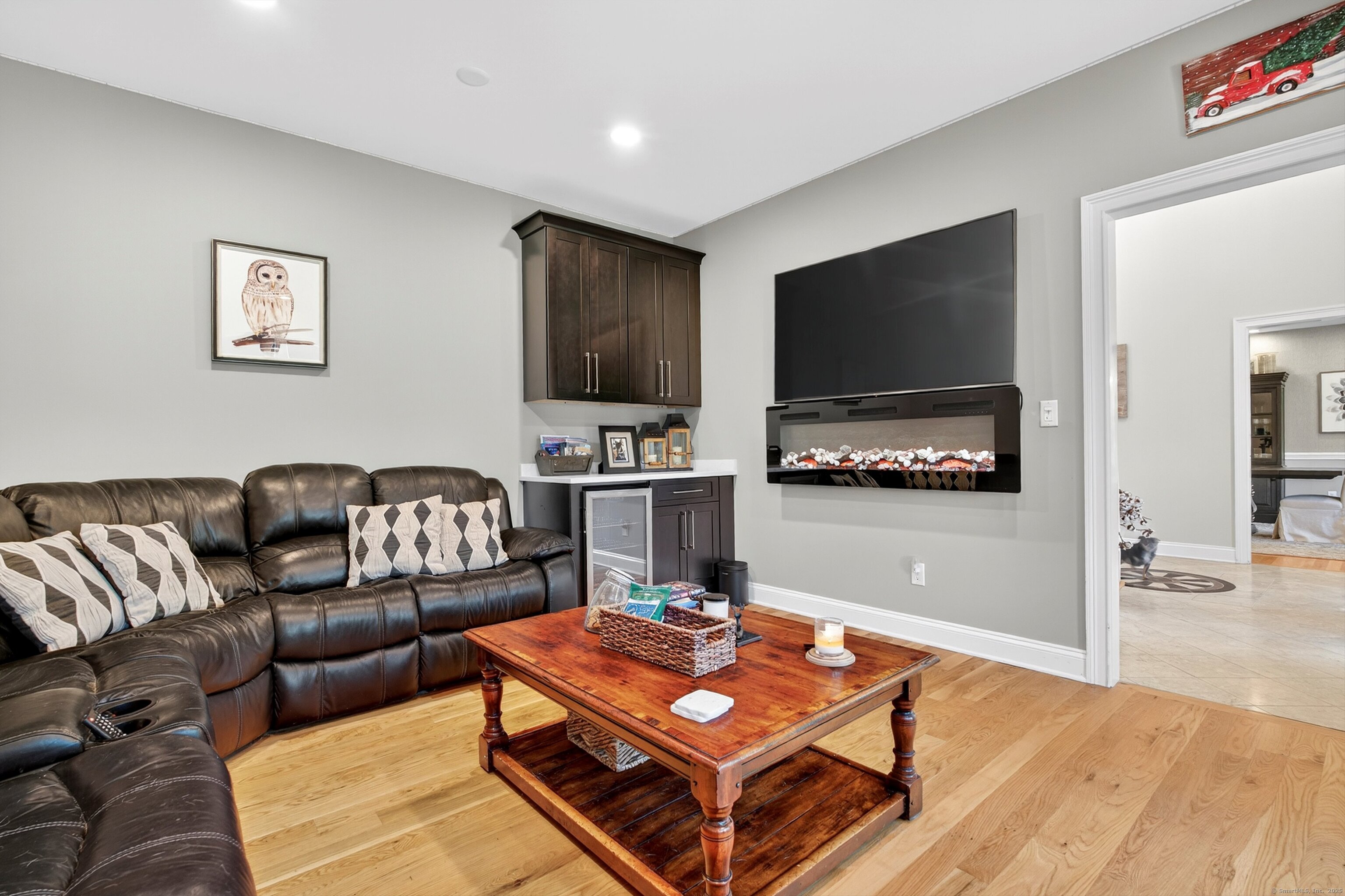99 Carriage Lane Roxbury, CT 06783 - Photo 7 of 38 a living room with furniture and a flat screen tv