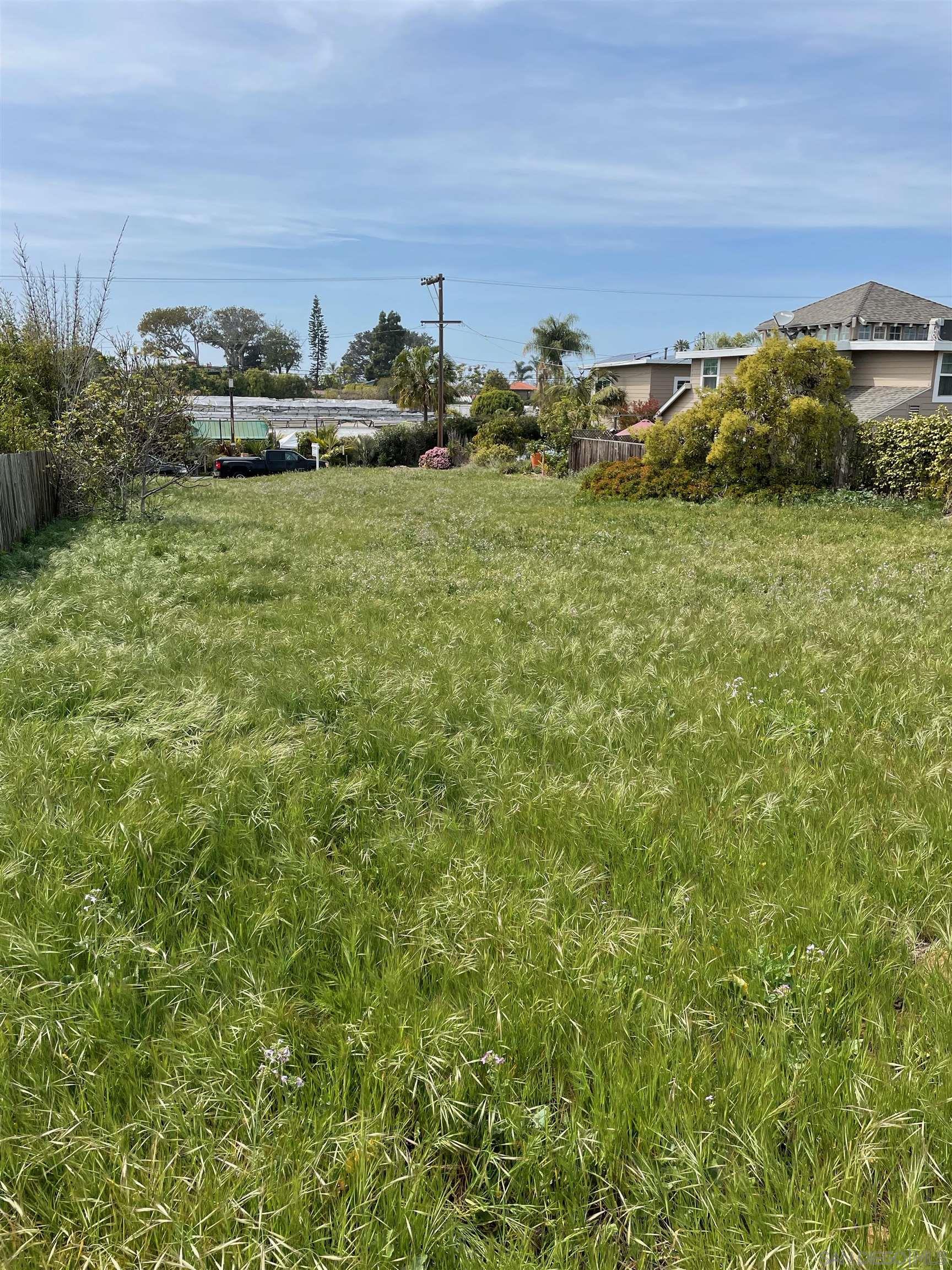 461 Ocean View Avenue Encinitas, CA 92024 - Photo 11 of 25 a view of a field with an ocean view
