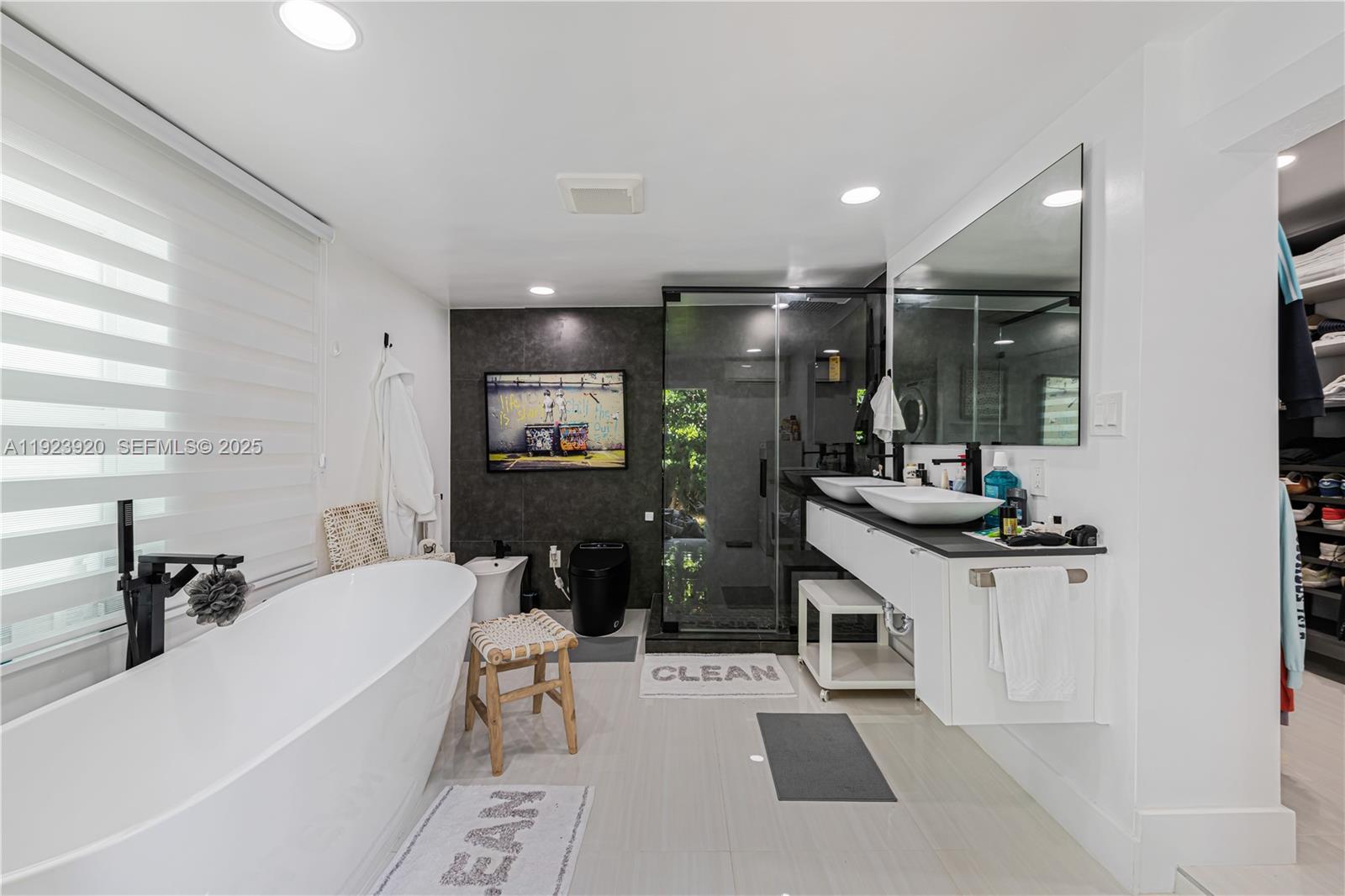 7235 Southwest 39th Street Miami, FL 33155 - Photo 19 of 30 a living room with furniture a dining table and chairs