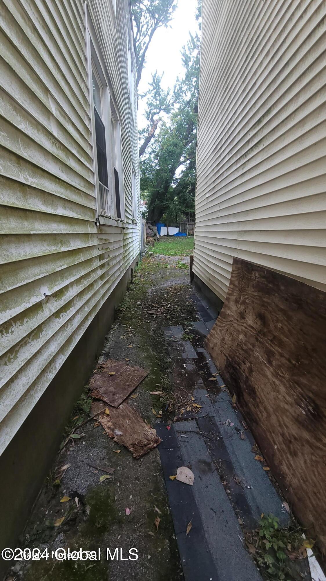 316 2nd Street Albany, NY 12206 - Photo 35 of 38 left side of house walk-way