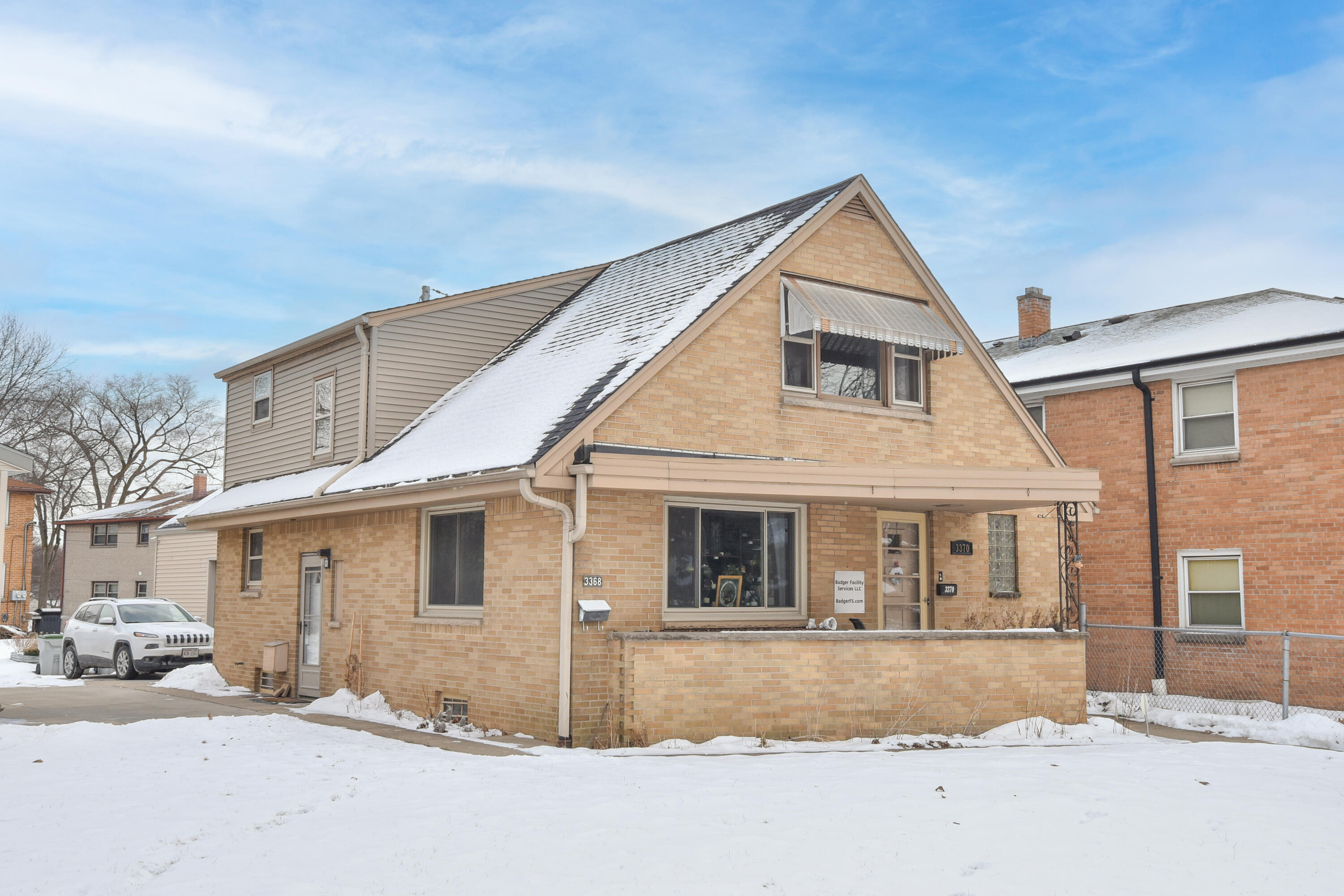 3370 South Howell Avenue, Unit 3372 Milwaukee, WI 53207 - Photo 2 of 38 Fenced in Front Yard