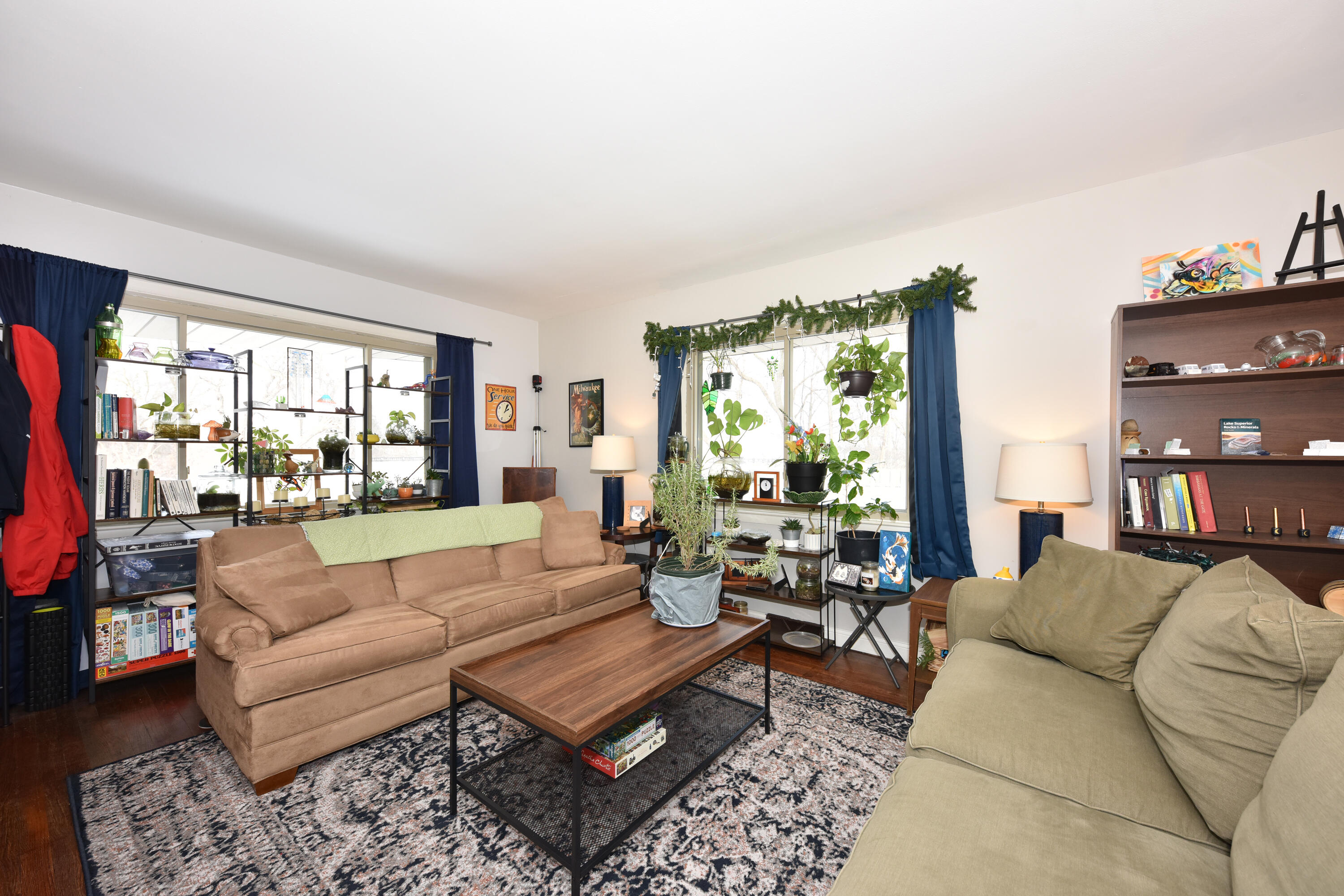 3370 South Howell Avenue, Unit 3372 Milwaukee, WI 53207 - Photo 3 of 38 Lower Living Room