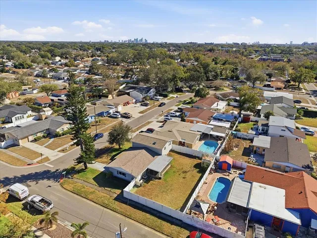 an aerial view of a city with lots of residential buildings