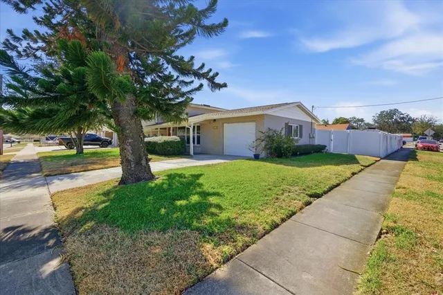 a view of a house with garden