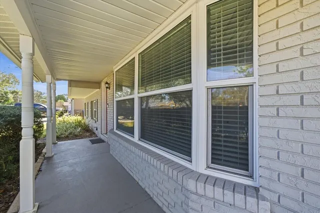 a view of a porch of a house