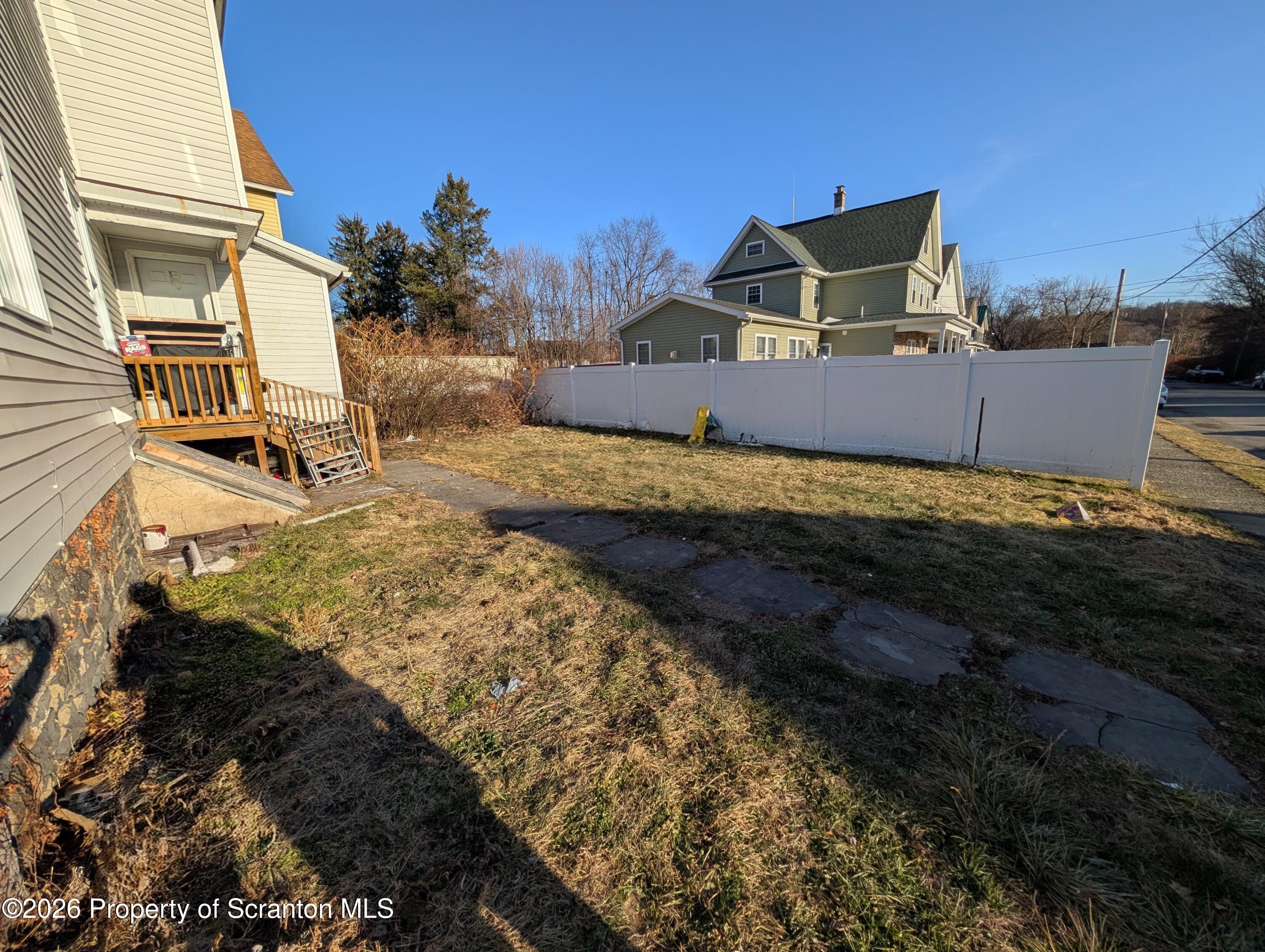 2402 North Main Avenue Scranton, PA 18508 - Photo 12 of 16 a view of a house with a yard