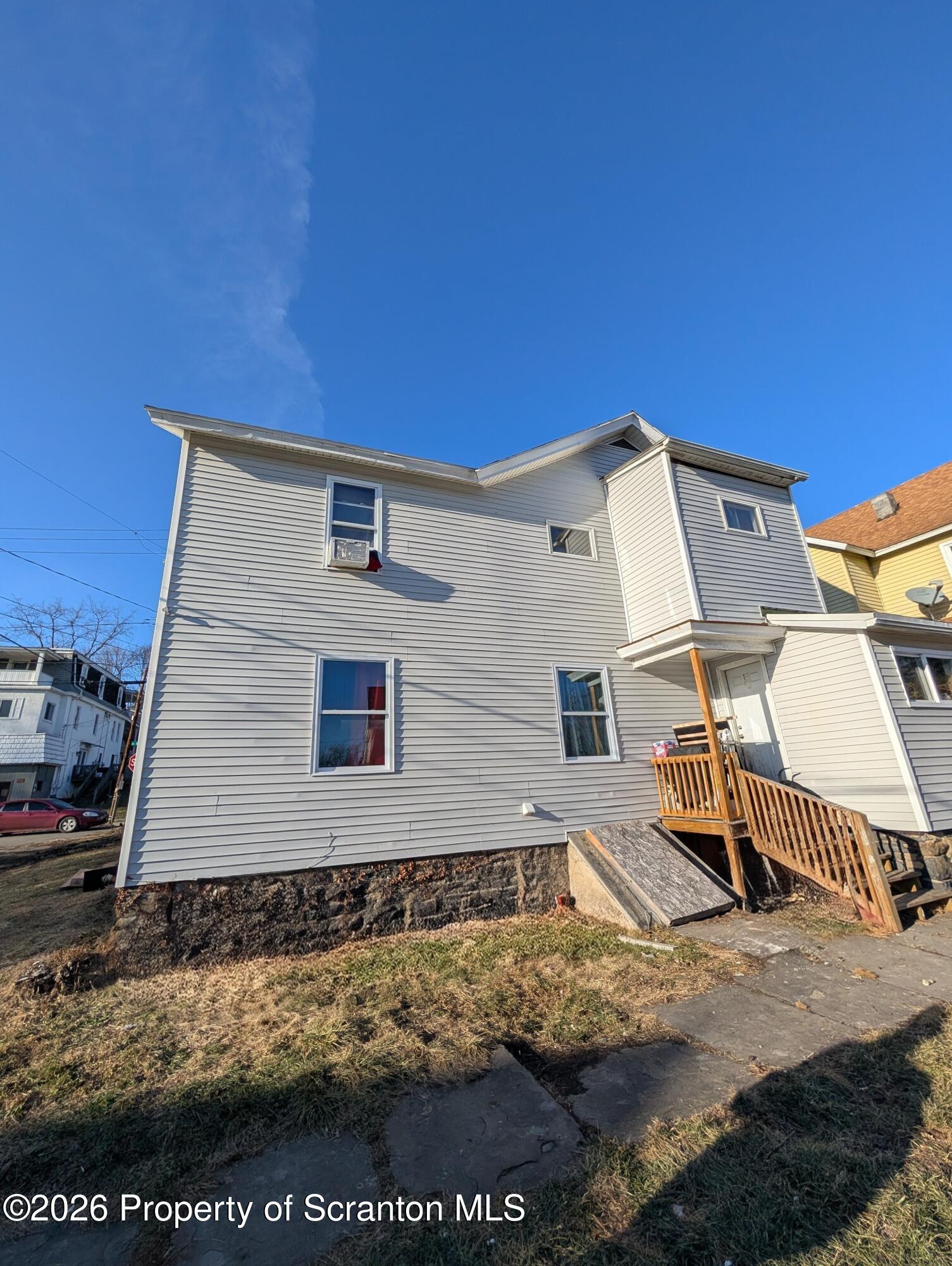 2402 North Main Avenue Scranton, PA 18508 - Photo 13 of 16 a view of a house with a yard