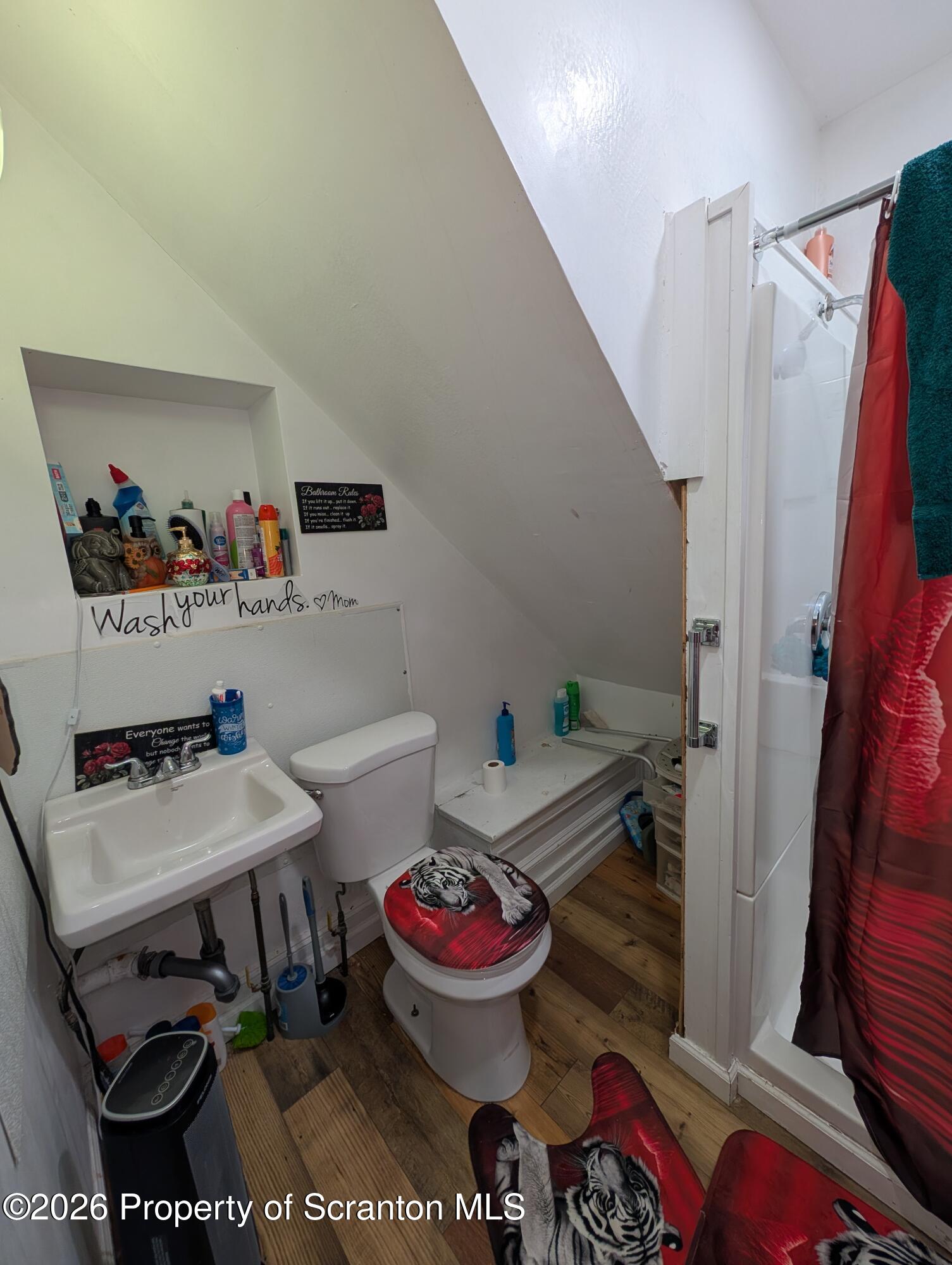 2402 North Main Avenue Scranton, PA 18508 - Photo 5 of 16 a room with furniture and a wooden floor