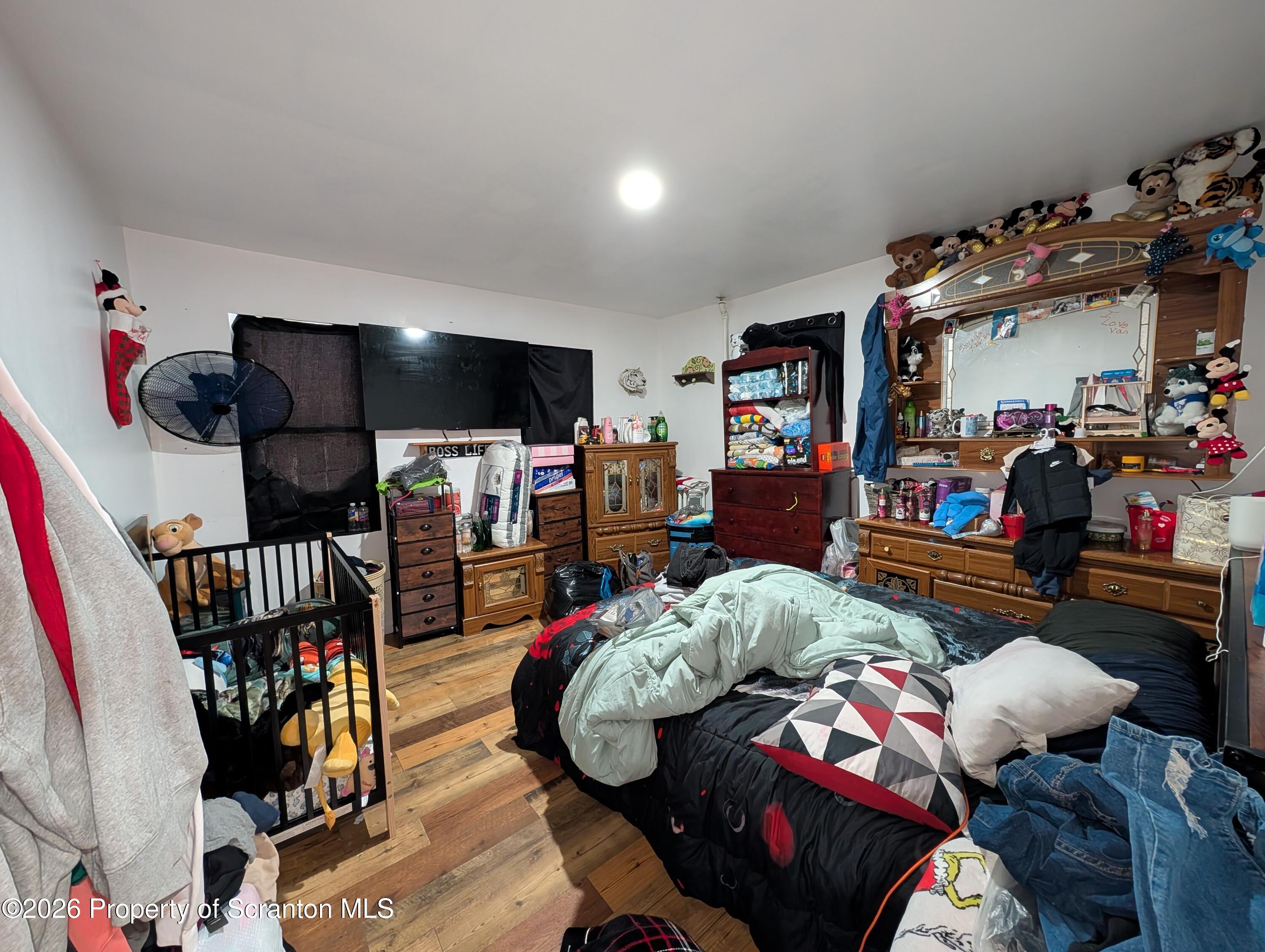 2402 North Main Avenue Scranton, PA 18508 - Photo 7 of 16 a living room with lots of furniture and toys