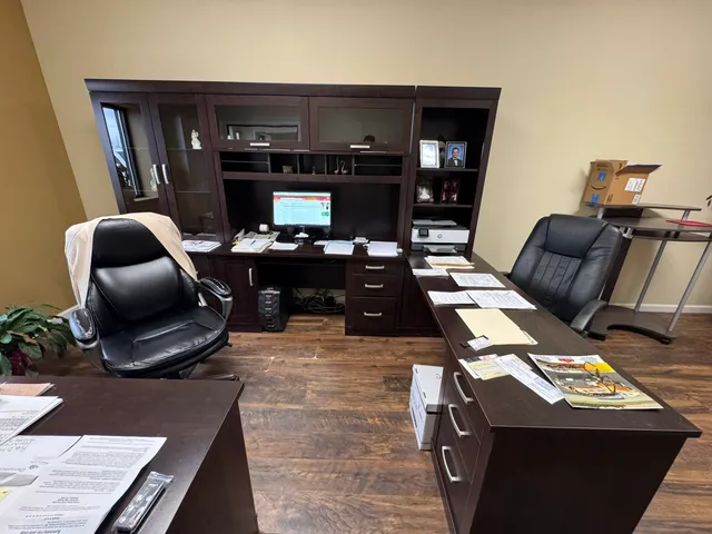 a living room with furniture gym equipment and a flat screen tv