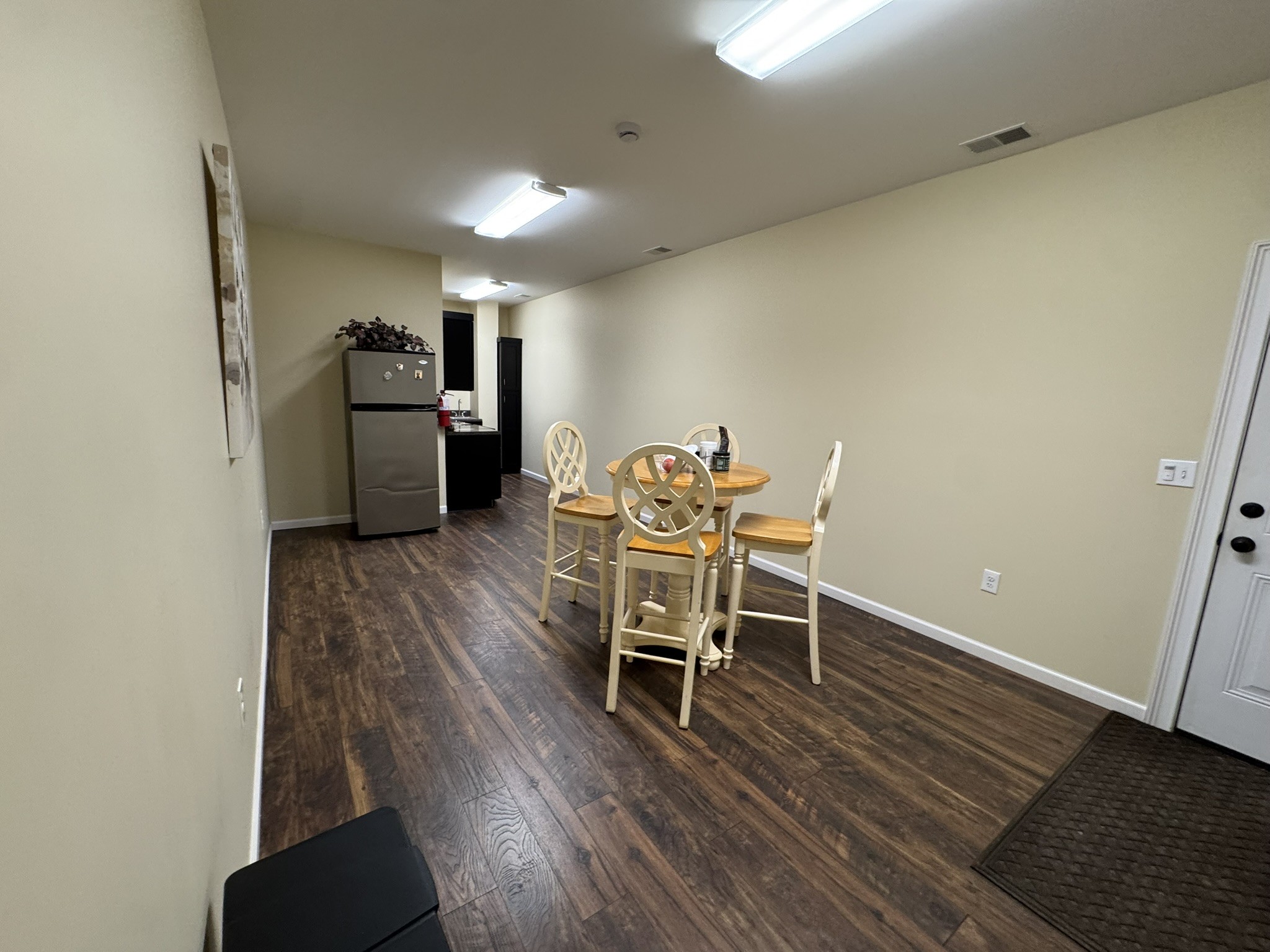 1087 Aedc Road Winchester, TN 37398 - Photo 21 of 28 a dining room with furniture and wooden floor