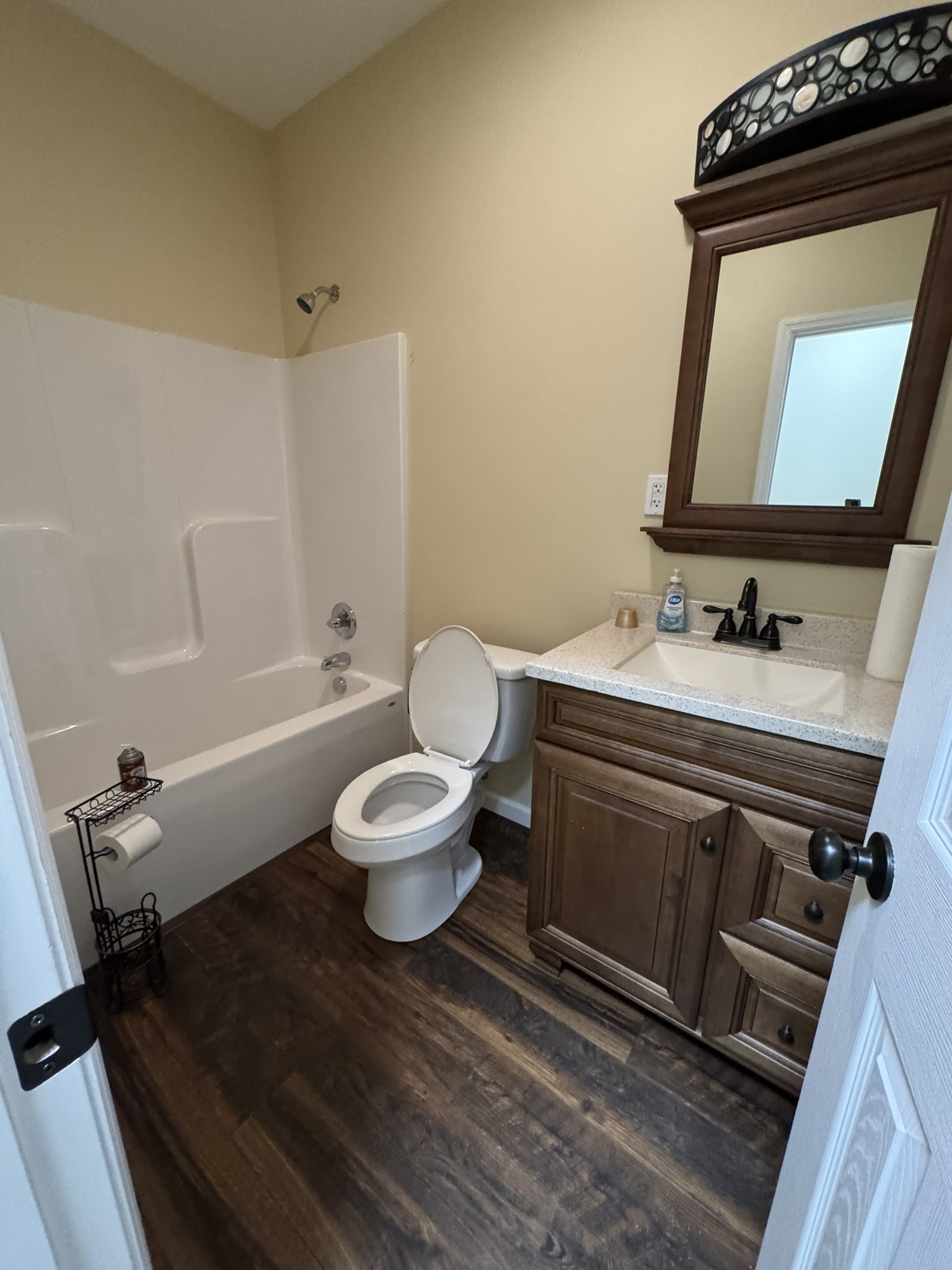 1087 Aedc Road Winchester, TN 37398 - Photo 27 of 28 a bathroom with a toilet sink and mirror