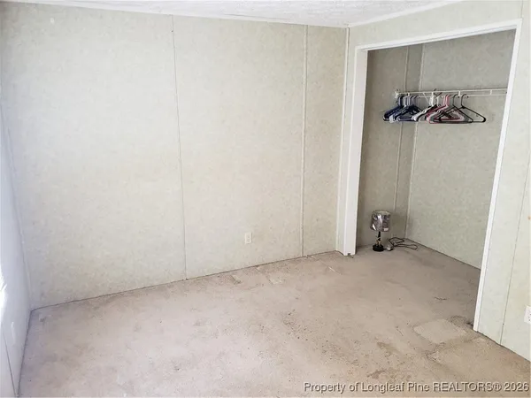 a kitchen with a sink cabinets and window
