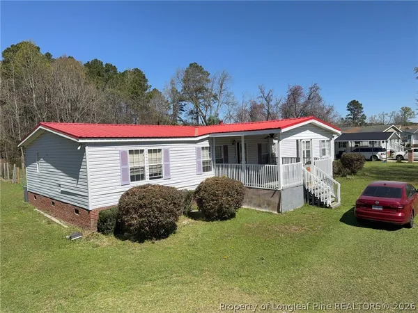 a view of backyard of house