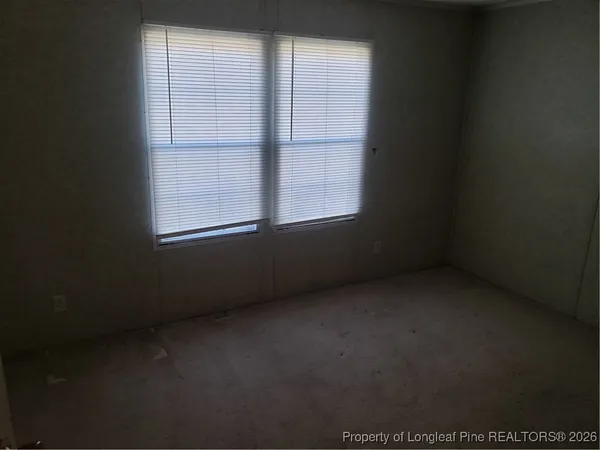 a utility room with cabinets