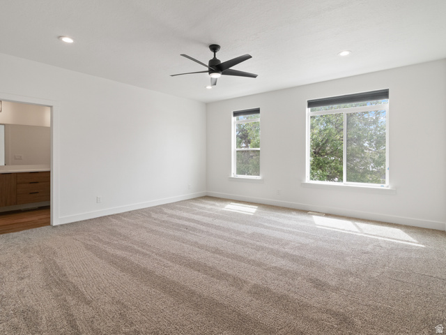 130 East 7085th South, Unit 3 Midvale, UT 84047 - Photo 15 of 30 Unfurnished room featuring carpet floors, recessed lighting, and ceiling fan