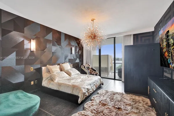 a bedroom with a bed and a couch