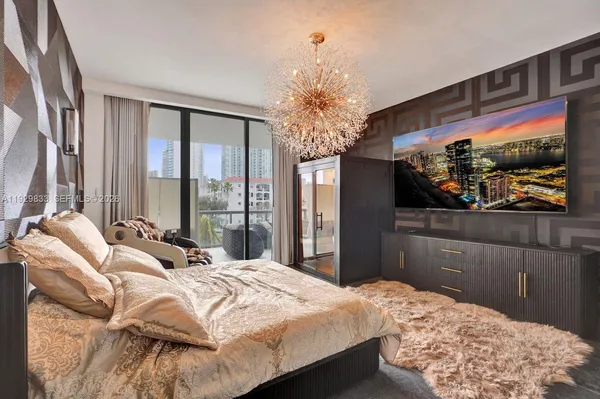 a bedroom with a bed dresser and a window