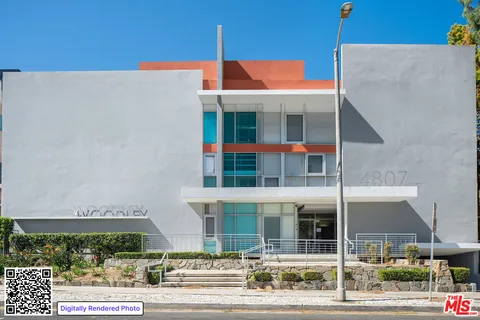 a view of a building with a sink and entryway