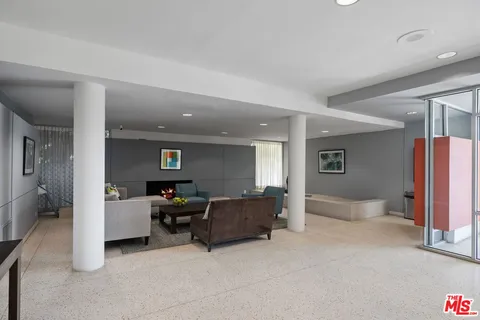 a living room with furniture and a couch