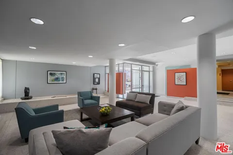 a living room with furniture and a couch