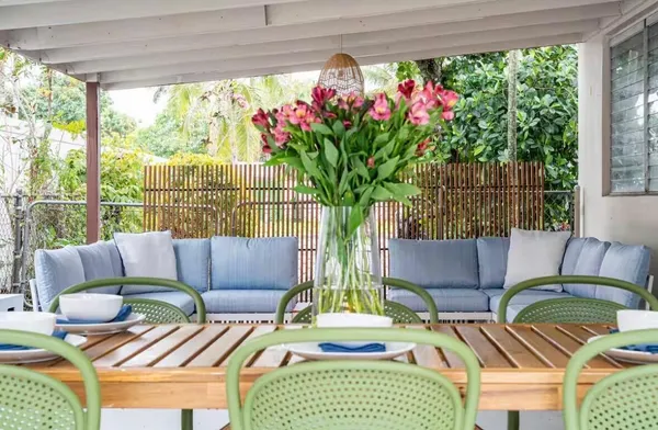 a view of a porch with furniture