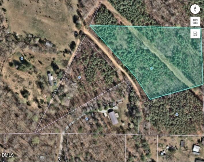 7227 Russell Road Hillsborough, NC 27278 - Photo 4 of 4 a view of a yard with a street view