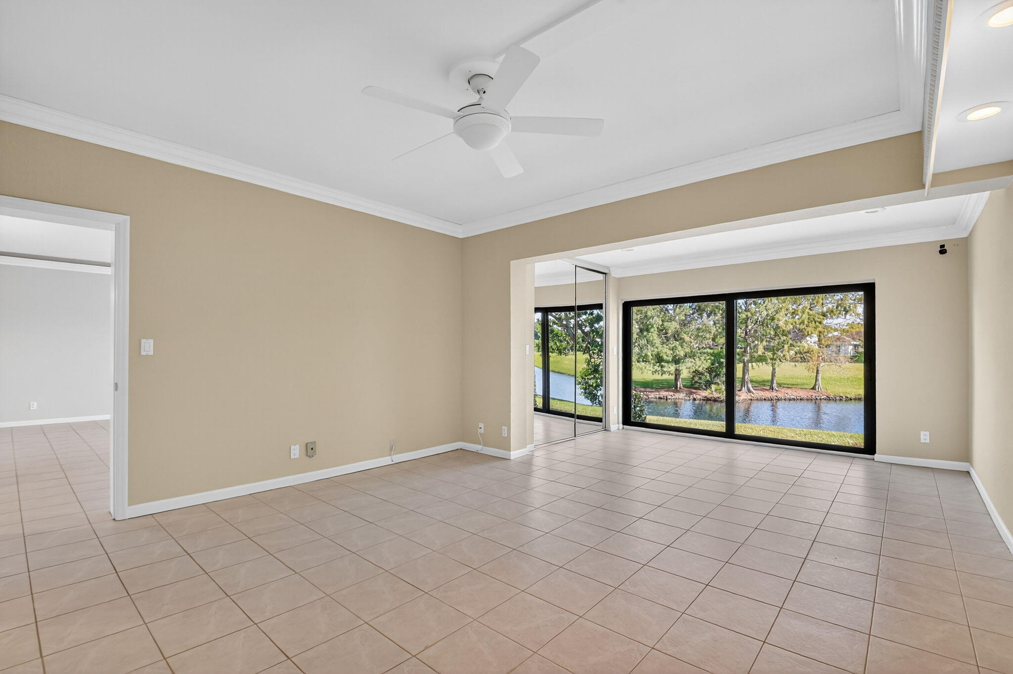 900 Greensward Lane, Unit 101G Delray Beach, FL 33445 - Photo 20 of 62 a view of an empty room with a window