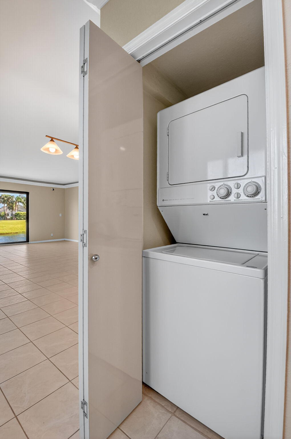 900 Greensward Lane, Unit 101G Delray Beach, FL 33445 - Photo 31 of 62 a close view of washer and dryer