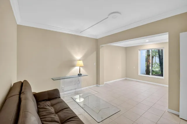 a view of swimming pool and lounge chair