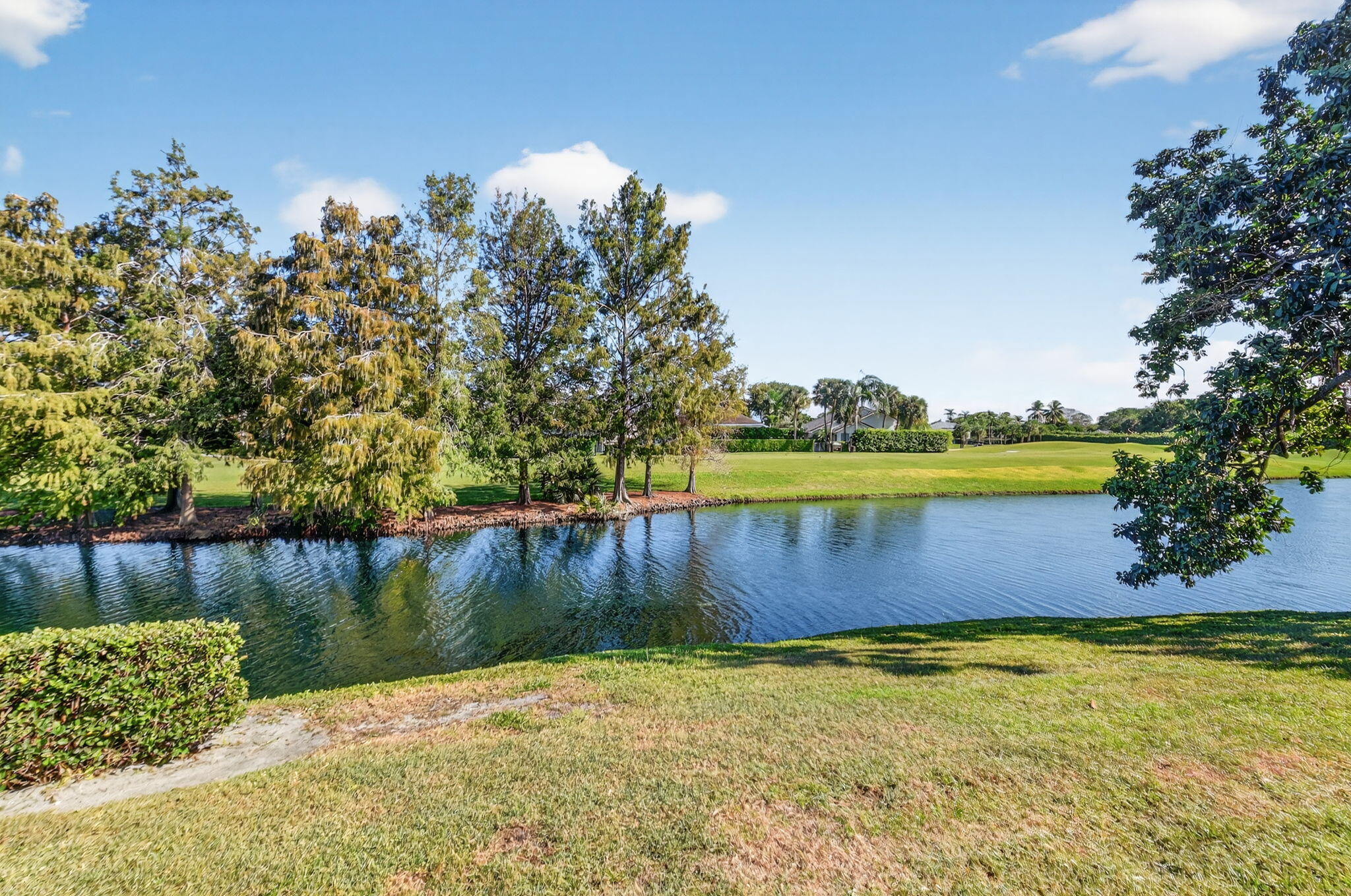 900 Greensward Lane, Unit 101G Delray Beach, FL 33445 - Photo 8 of 62 a view of swimming pool and outdoor space