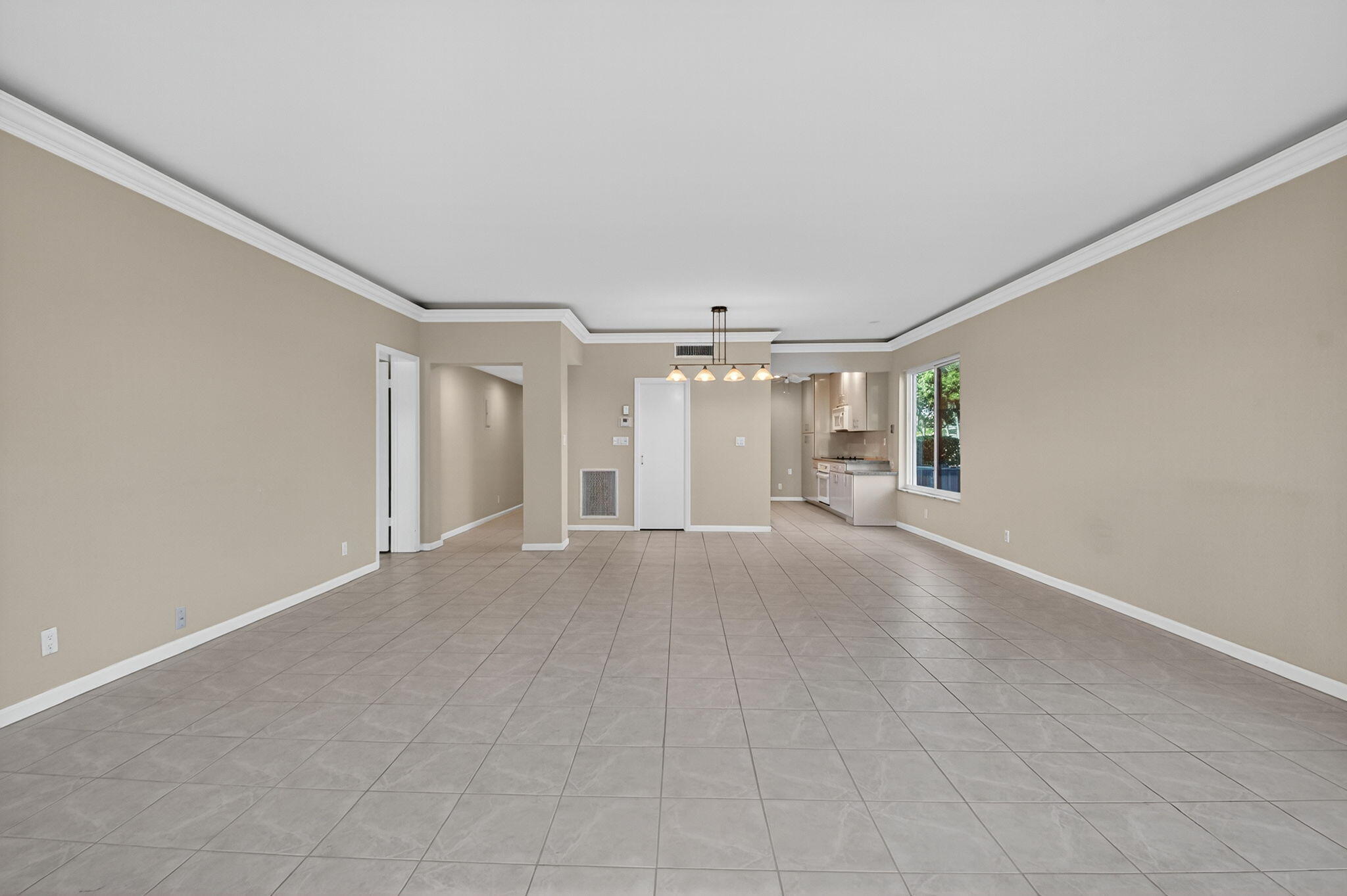 900 Greensward Lane, Unit 101G Delray Beach, FL 33445 - Photo 10 of 62 a view of a big room with closet and windows
