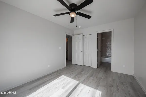 a view of an empty room and window